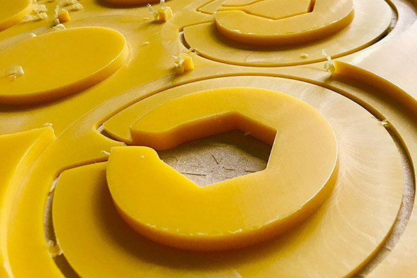Plastic components that have been cut using high tech CNC equipment at a UK facility.