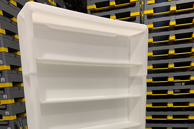Custom fabricated plastic products in a UK warehouse.